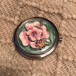 Ornate cosmetic mirror